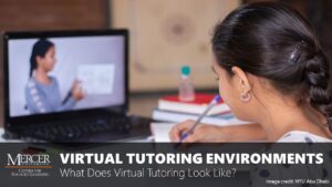 An image of a girl from the perspective of looking over her shoulder at a laptop screen. The girl is sitting at a table with books piled next to her, and she holds a pen while taking notes. On the laptop screen is an image of a woman holding a book as if it's an instructional video. The image is a thumbnail linking to the training entitled Virtual Tutoring Environments: What Does Virtual Tutoring Look Like?